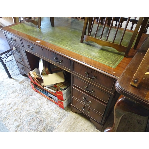 441 - A late 20thC green leather inlaid pedestal/partners desk, 60'' wide