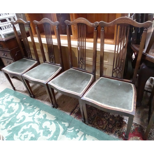 445 - A set of four dining chairs