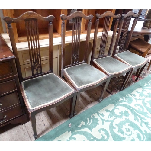 445 - A set of four dining chairs