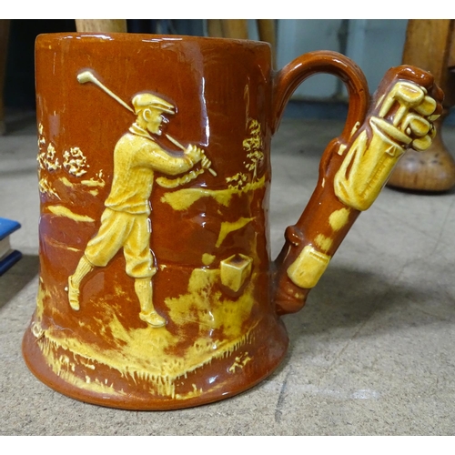 449 - A tall West German vase, together with a Dartmouth pottery golfing pint tankard