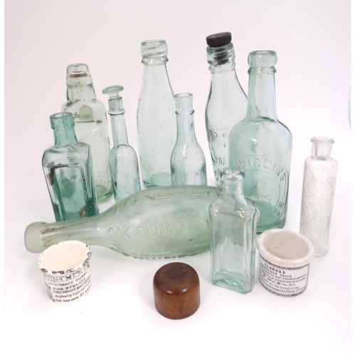 451 - A quantity of assorted  glass bottles to include a bulb necked cod, hamilton , lemonade etc  togethe... 