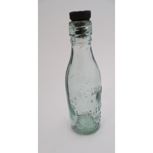 451 - A quantity of assorted  glass bottles to include a bulb necked cod, hamilton , lemonade etc  togethe... 