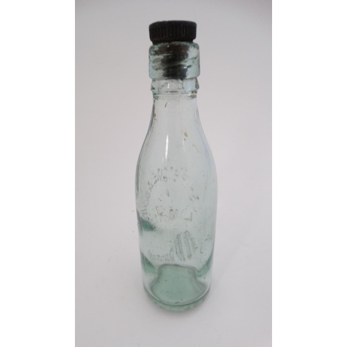 451 - A quantity of assorted  glass bottles to include a bulb necked cod, hamilton , lemonade etc  togethe... 