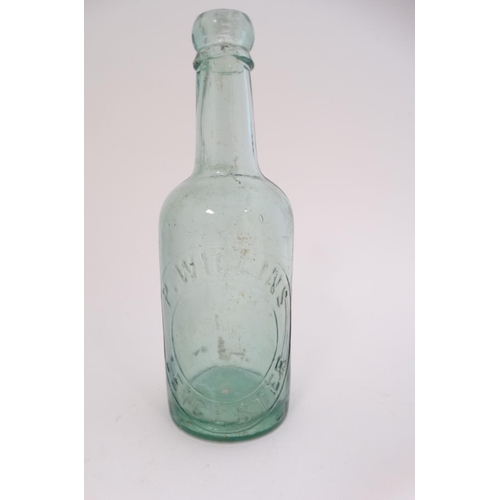 451 - A quantity of assorted  glass bottles to include a bulb necked cod, hamilton , lemonade etc  togethe... 