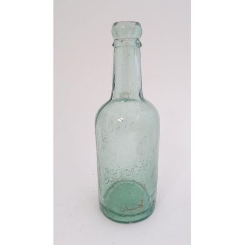 451 - A quantity of assorted  glass bottles to include a bulb necked cod, hamilton , lemonade etc  togethe... 