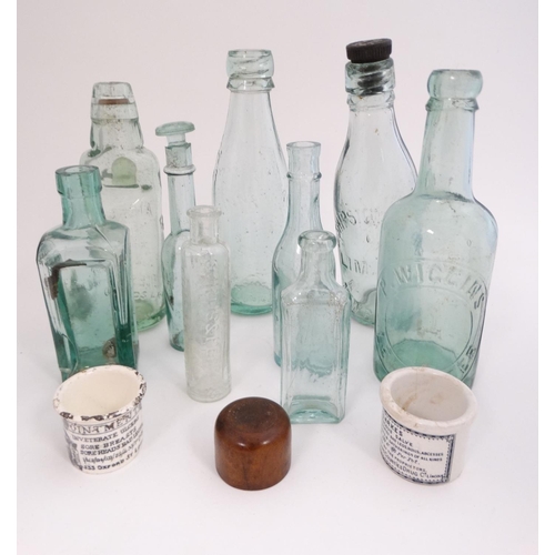 451 - A quantity of assorted  glass bottles to include a bulb necked cod, hamilton , lemonade etc  togethe... 