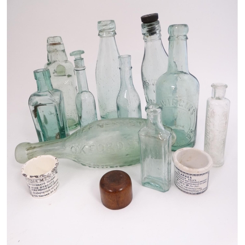 451 - A quantity of assorted  glass bottles to include a bulb necked cod, hamilton , lemonade etc  togethe... 