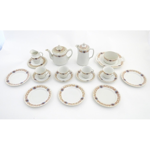 47 - A Czecho Slovakie tea set with banded decoration to include still lifes in vignettes. Includes cups ... 