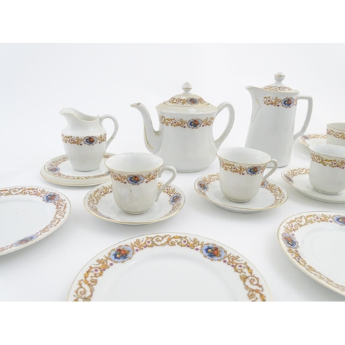 47 - A Czecho Slovakie tea set with banded decoration to include still lifes in vignettes. Includes cups ... 