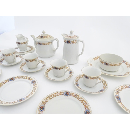 47 - A Czecho Slovakie tea set with banded decoration to include still lifes in vignettes. Includes cups ... 