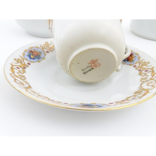 47 - A Czecho Slovakie tea set with banded decoration to include still lifes in vignettes. Includes cups ... 