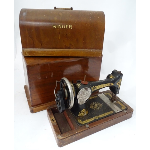 472 - Two sewing machines, one boxed and one treadle (2)