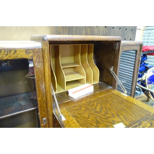 473 - 1940's bureau with glazed sections either side, together with a draw-leaf table (2)