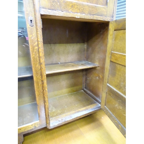 473 - 1940's bureau with glazed sections either side, together with a draw-leaf table (2)