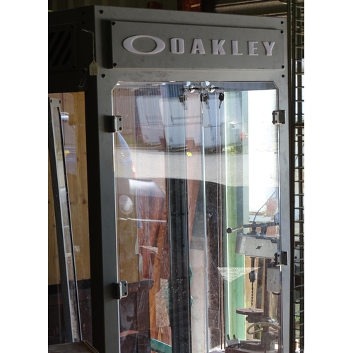 475 - An Oakley sunglasses display cabinet