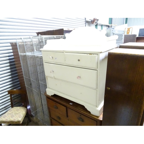 479 - A white painted child's chest of drawers