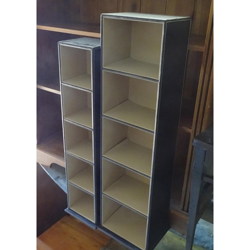 485 - A pine bookcase, together with 2 leather covered stationary racks