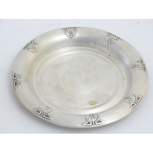 500 - A silver plate bowl by Adie Bros together with an aluminium embossed circular plate. the largest 11'... 