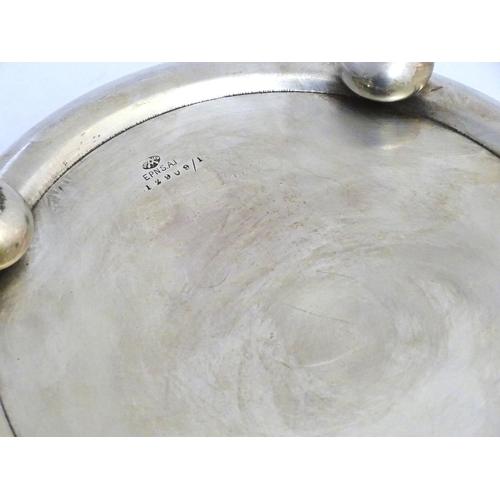 500 - A silver plate bowl by Adie Bros together with an aluminium embossed circular plate. the largest 11'... 