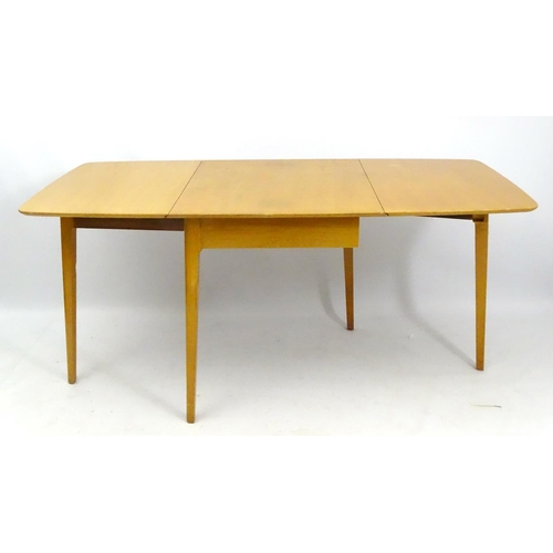 538 - Retro Vintage : a British Meredew drop flap extendable No. 408 table and 4 single chairs in light oa... 