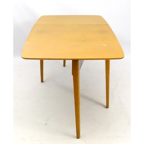 538 - Retro Vintage : a British Meredew drop flap extendable No. 408 table and 4 single chairs in light oa... 