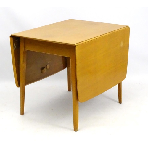 538 - Retro Vintage : a British Meredew drop flap extendable No. 408 table and 4 single chairs in light oa... 