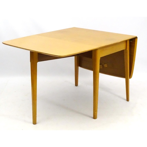 538 - Retro Vintage : a British Meredew drop flap extendable No. 408 table and 4 single chairs in light oa... 