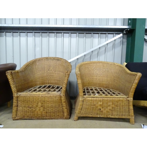 556 - A pair of wicker armchairs