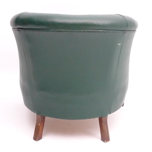 57 - A mid 20thC green tub chair standing on squared tapering legs. 28'' wide x 25'' deep.