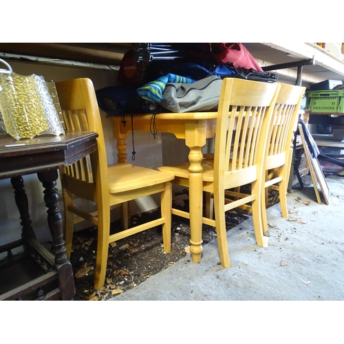 571 - A satin finished pine kitchen table and 4 matching chairs