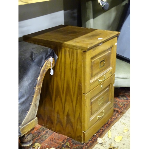 578 - A wooden filing cabinet