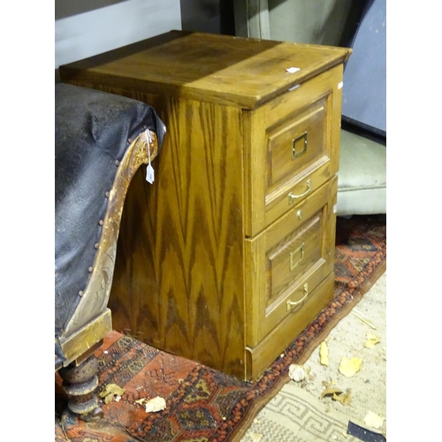 578 - A wooden filing cabinet