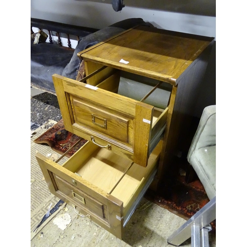 578 - A wooden filing cabinet