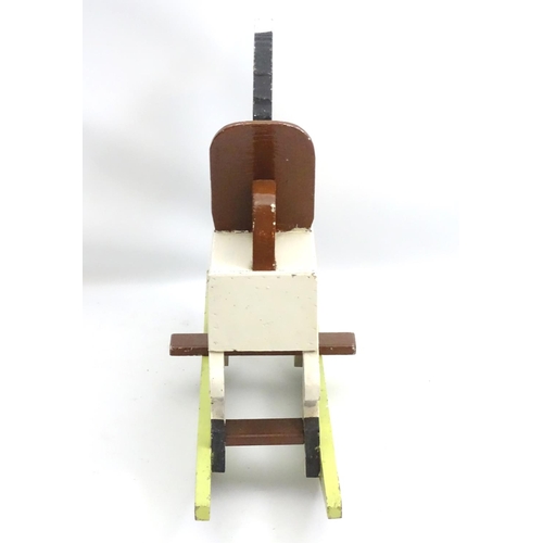 66 - Rocking horse : a scratch built and painted wooden rocking horse on bows with brown painted back and... 