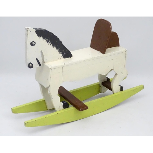 66 - Rocking horse : a scratch built and painted wooden rocking horse on bows with brown painted back and... 