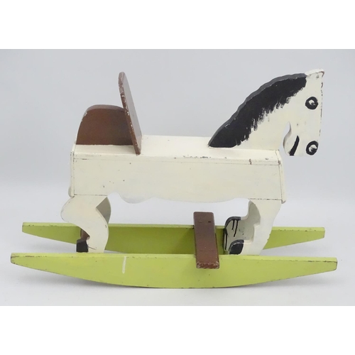 66 - Rocking horse : a scratch built and painted wooden rocking horse on bows with brown painted back and... 