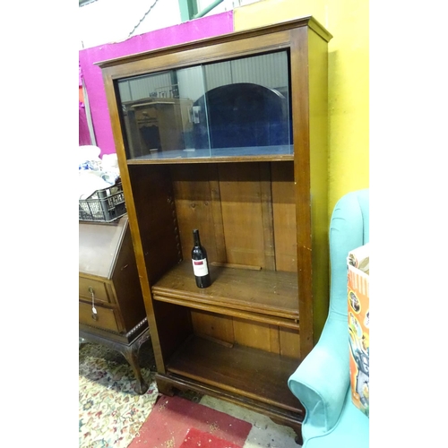 67 - A large stained pine 4 tier bookcase, with glazed and blue baize lined top section