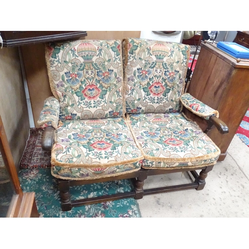 72 - A Parker Knoll two-seater sofa with floral upholstery