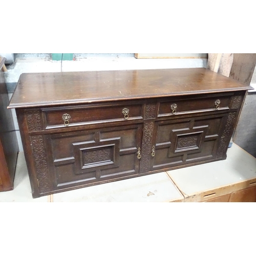 83 - An oak lowboy/small cupboard