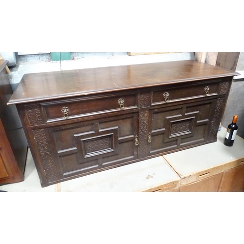 83 - An oak lowboy/small cupboard