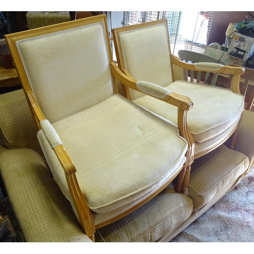 9 - A pair of Louis XV style armchairs