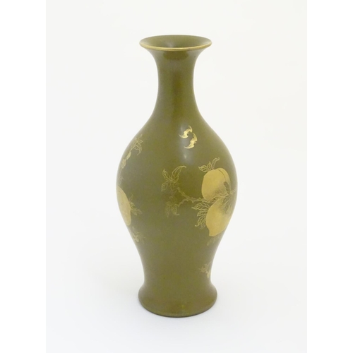 1 - A Chinese tea dust glaze vase with gilt fruit, bat and branch decoration. Character marks under. App... 