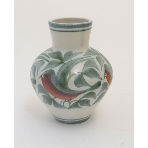 100 - A Laurence McGowan British studio pottery vase with hand painted decoration of birds in foliage arou... 