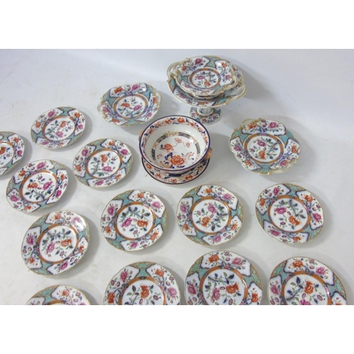 104 - A Coalport / Masons style dessert service including, 12 plates and 4 tazza's together with a Winfiel... 