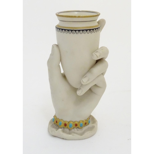 108 - A quantity of ceramic items to include a Worcester vase formed as hand holding a Grecian urn, decora... 