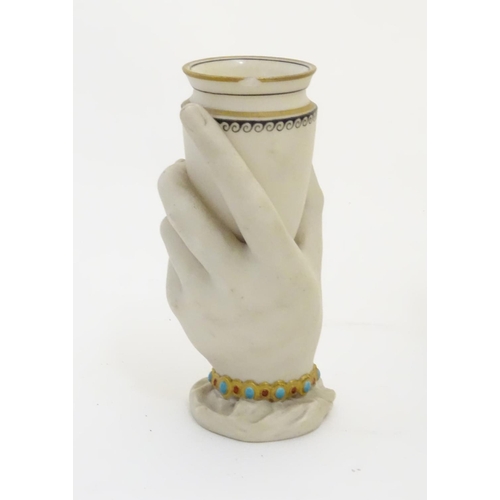 108 - A quantity of ceramic items to include a Worcester vase formed as hand holding a Grecian urn, decora... 