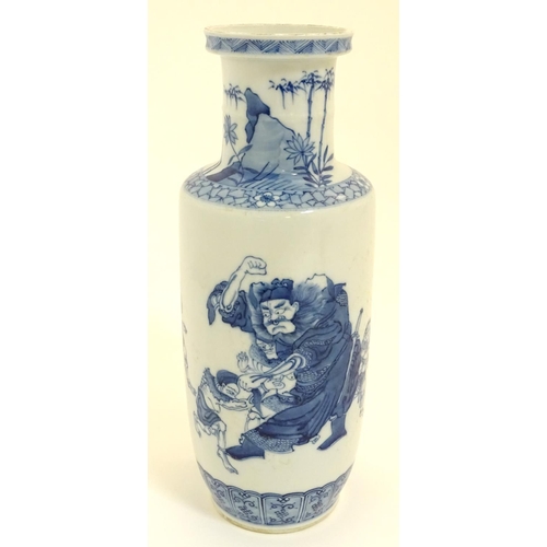 11 - A Chinese blue and white Rouleau vase, decorated in an underglaze blue depicting the Chinese mytholo... 