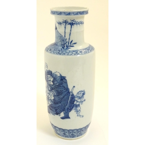 11 - A Chinese blue and white Rouleau vase, decorated in an underglaze blue depicting the Chinese mytholo... 