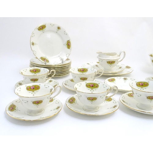 111 - An early 20thC Shelley ' Late Foley '' tea set , to include 11 plates, 11 saucers, 9 cups , milk jug... 