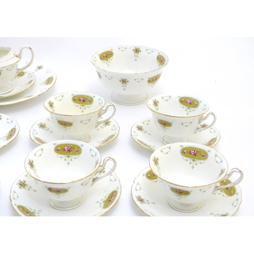 111 - An early 20thC Shelley ' Late Foley '' tea set , to include 11 plates, 11 saucers, 9 cups , milk jug... 